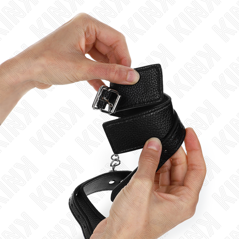 KINK - HANDGELENKFESSELN MIT SCHLANGENMUSTER, SCHWARZ, VERSTELLBAR 20-28 CM X 5,4 CM - Sexotim