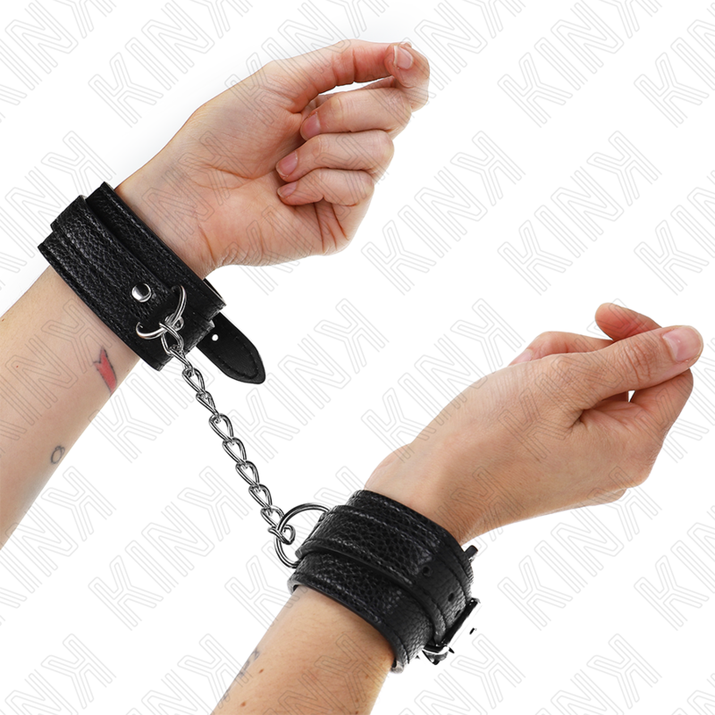 KINK - HANDGELENKFESSELN MIT SCHLANGENMUSTER, SCHWARZ, VERSTELLBAR 20-28 CM X 5,4 CM - Sexotim