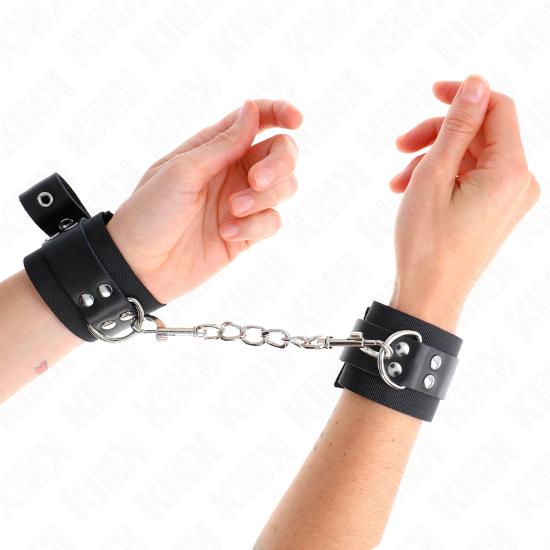 KINK - NYLON HANDGELENKFESSELN SCHWARZ MIT LEDERGURTE SCHWARZ VERSTELLBAR 19-29 CM X 5,1 CM - Sexotim