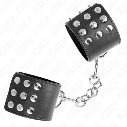 KINK - HANDGELENKFESSELN MIT DRUCKVERSCHLUSS SCHWARZ VERSTELLBAR 19-24 CM X 5,5 CM - Sexotim