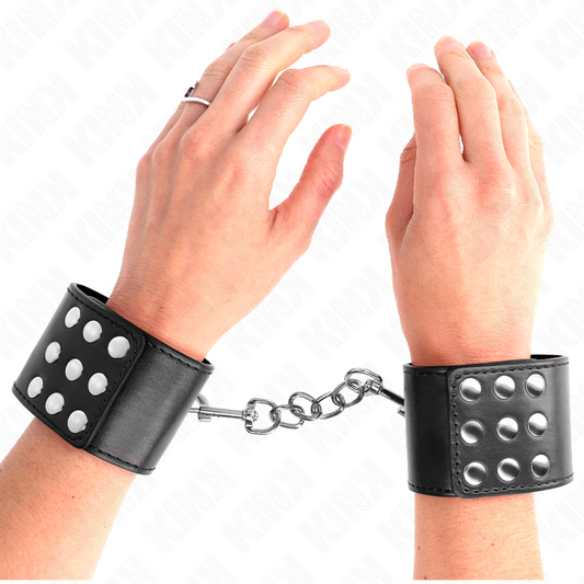 KINK - HANDGELENKFESSELN MIT DRUCKVERSCHLUSS SCHWARZ VERSTELLBAR 19-24 CM X 5,5 CM - Sexotim