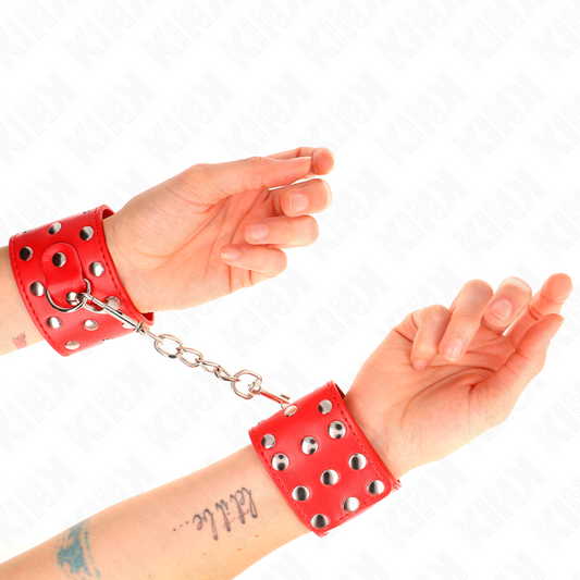 KINK - HANDGELENKFESSELN MIT DRUCKVERSCHLUSS VOLLER NIETEN ROT VERSTELLBAR 19-24 CM X 5,5 CM - Sexotim
