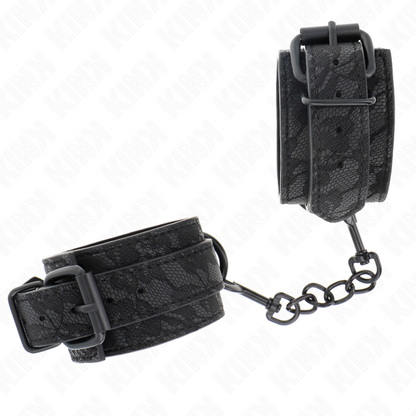 KINK - MIT DUNKLER SPITZE ÜBERZOGENE HANDGELENKMANSCHETTEN VERSTELLBAR SCHWARZ 19-26 CM - Sexotim