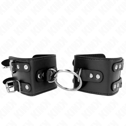 KINK - FESTE HANDGELENKFESSELN MIT RING UND NIETEN VERSTELLBAR SCHWARZ 17-22 CM X 6,5 CM - Sexotim