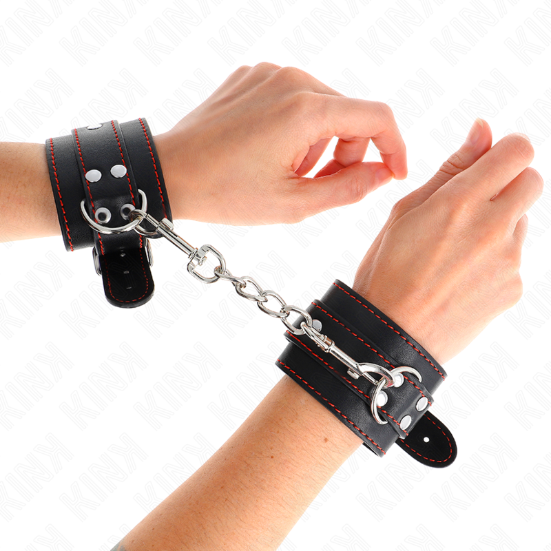 KINK - HANDGELENKFESSELN SCHWARZ MIT ROTEM FUTTER VERSTELLBAR 20-28 CM X 5,5 CM - Sexotim